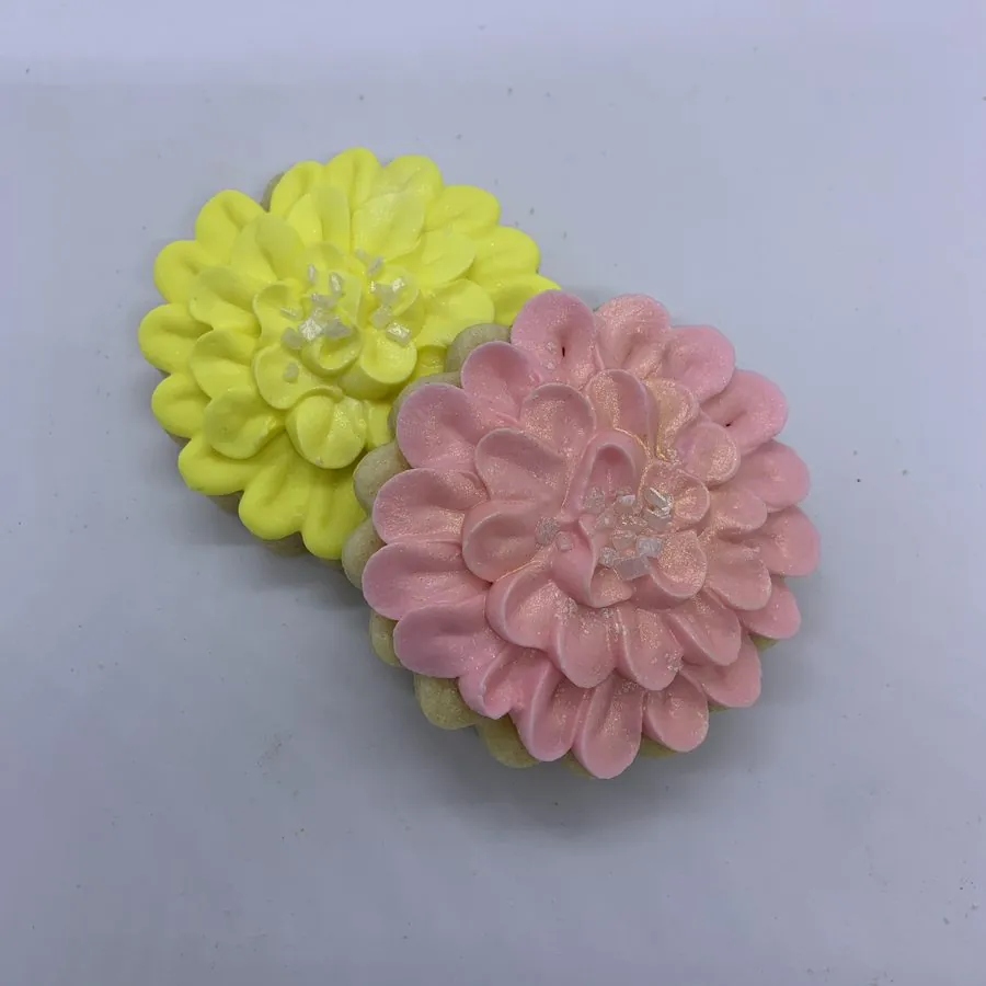 Yellow and pink piped dahlia cookies